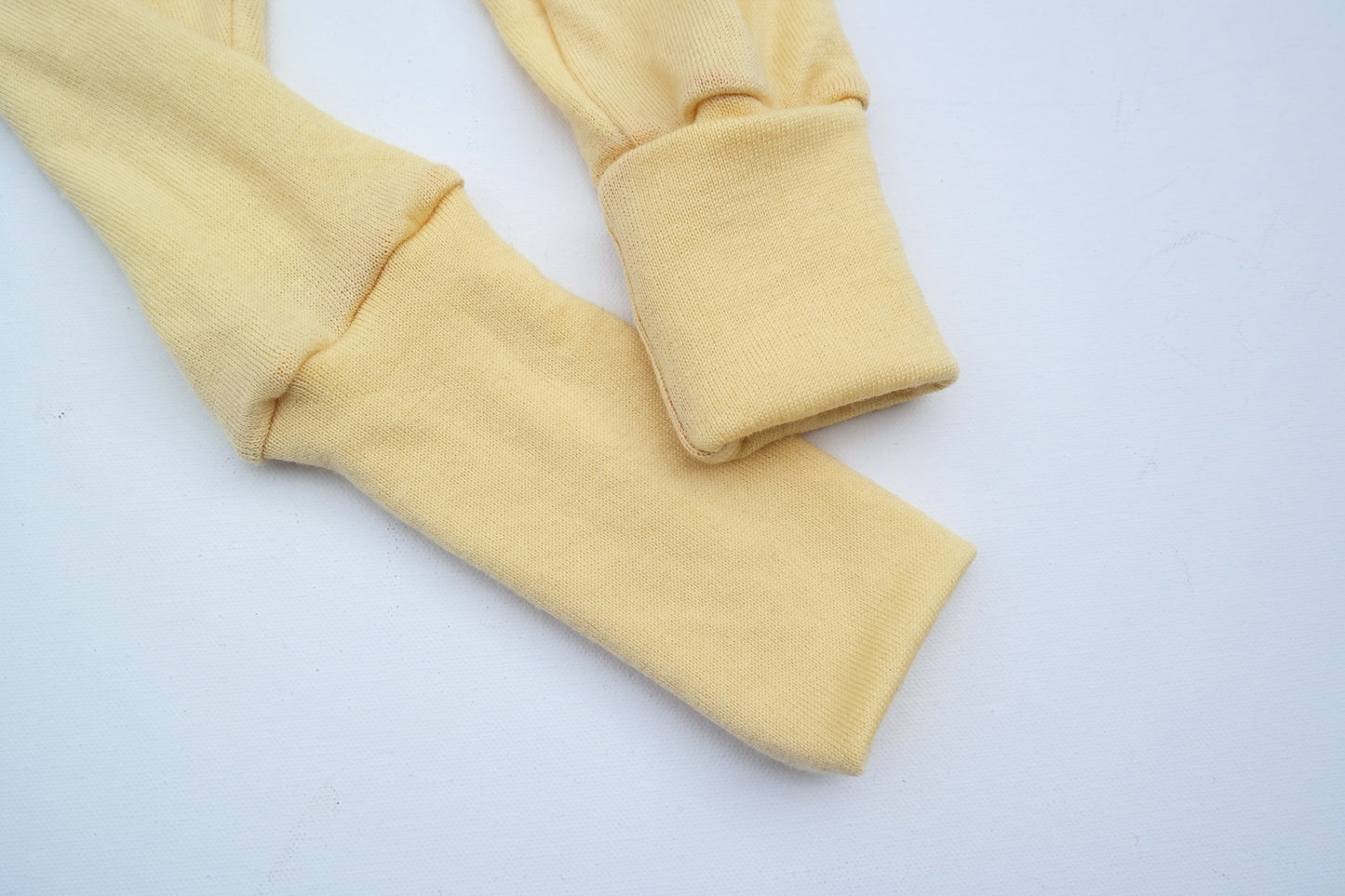 Growing pants for toddlers 86/92 & 98/104 made from upcycled wool in light yellow