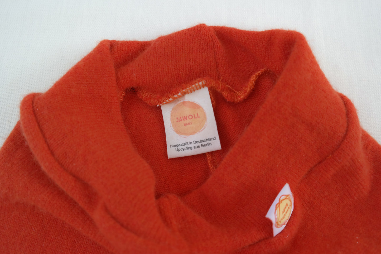Growing pants for babies and toddlers 74/80 made from 100% upcycled cashmere in coral orange