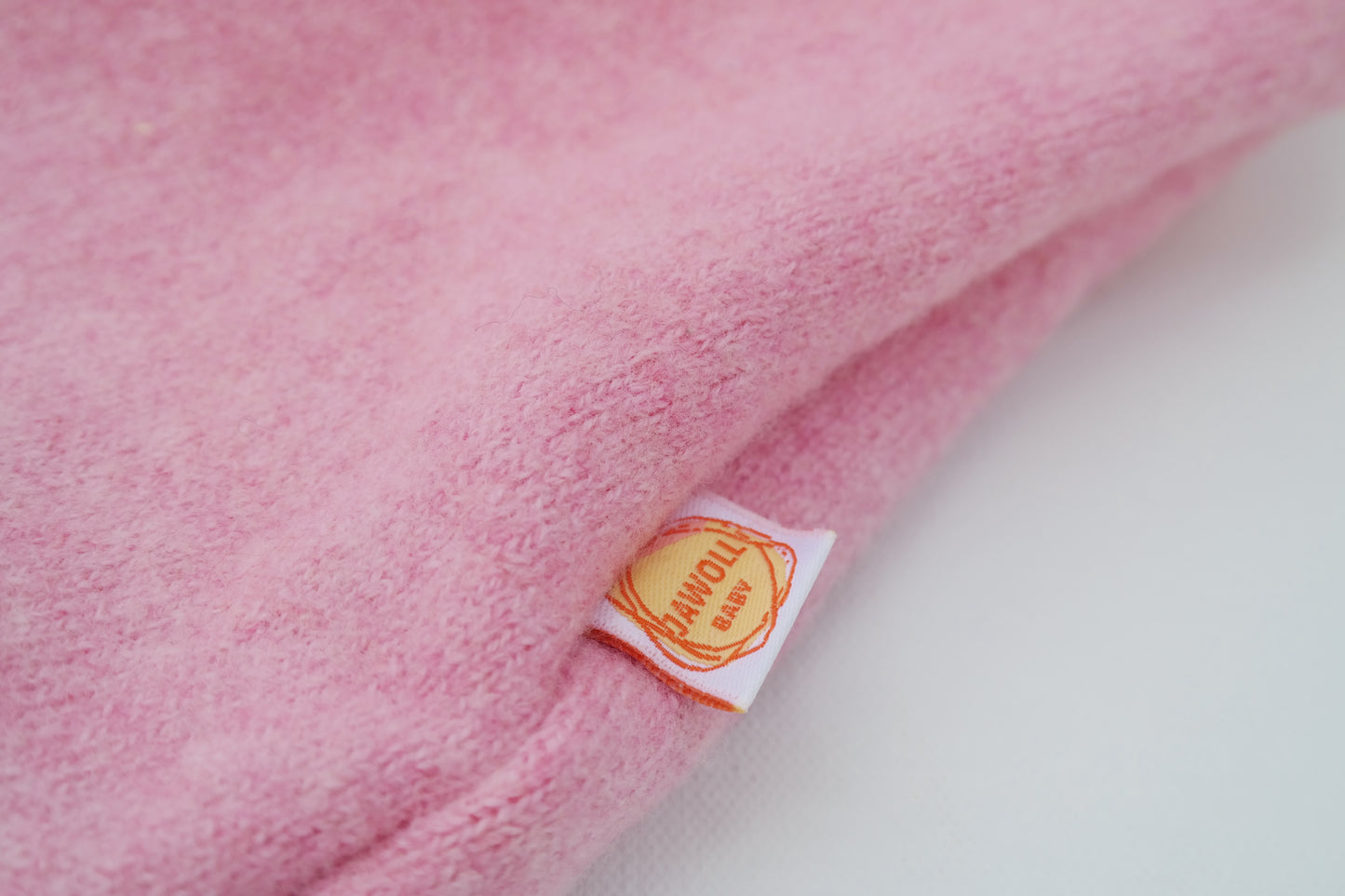 Wende-Weste für Kleinkinder aus Upcycling Wolle – mitwachsend von Größe 80 bis 116 in Rosa und Buttergelb
