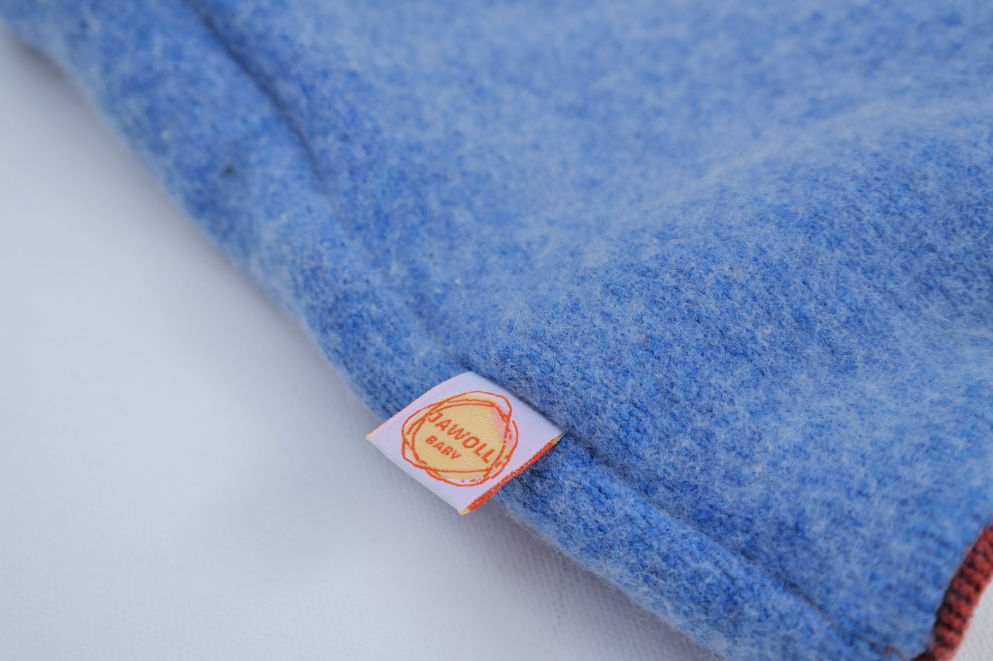 Wende-Weste für Kleinkinder aus Upcycling Kaschmir Merinowolle – mitwachsend von Größe 80 bis 116 in Himmelblau und Rostbraun