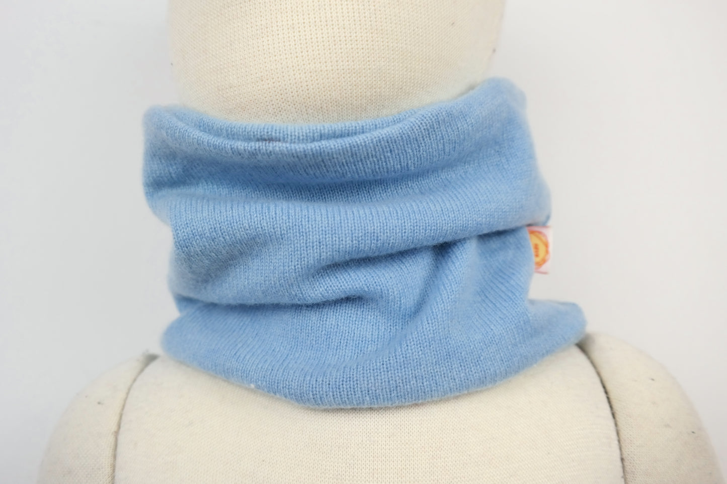 Loop for toddlers made of upcycled cashmere compacted in dark green