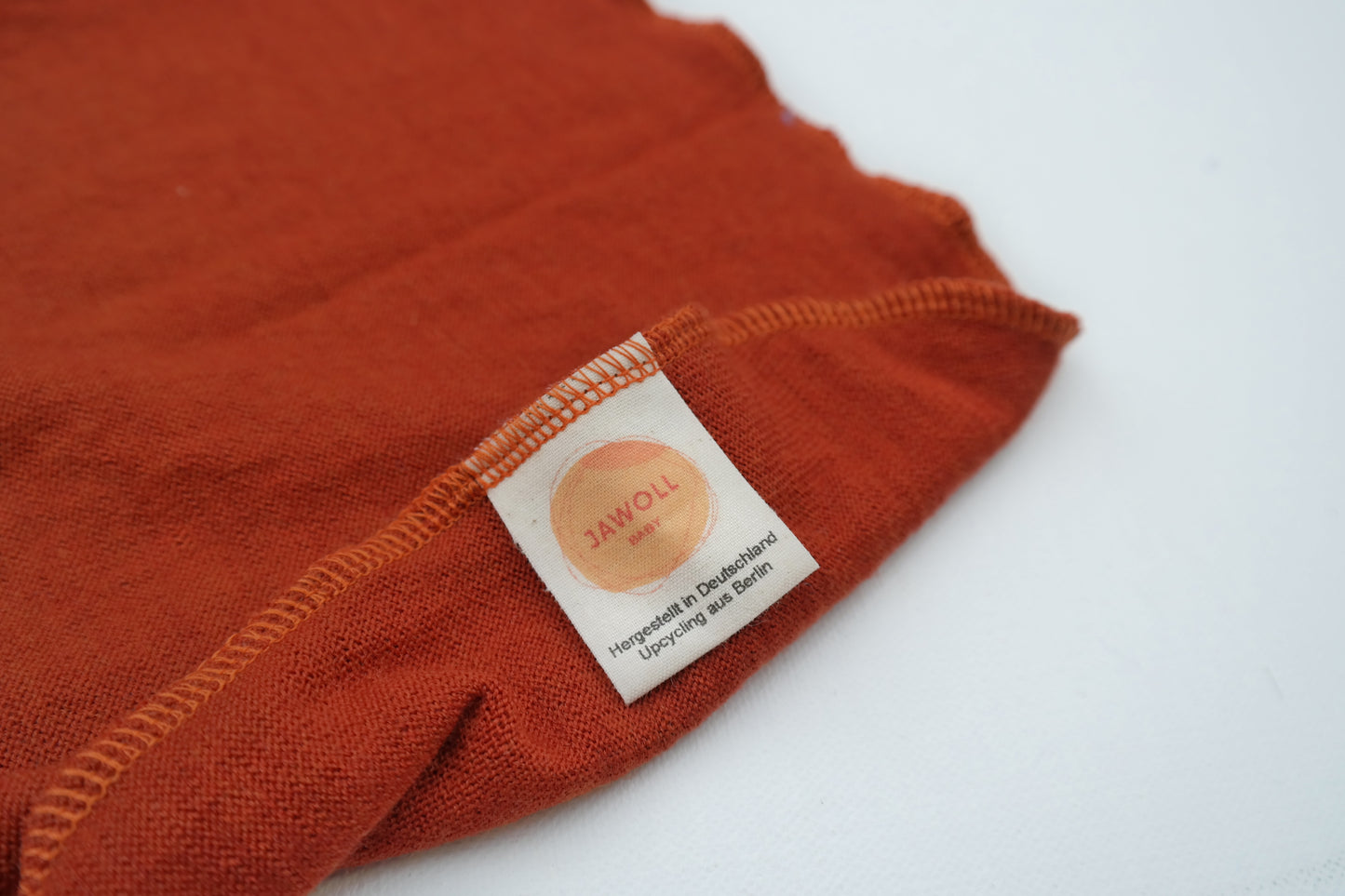 Lightweight summer romper sleeping bag for babies 0-6 months made from upcycled wool in pastel yellow