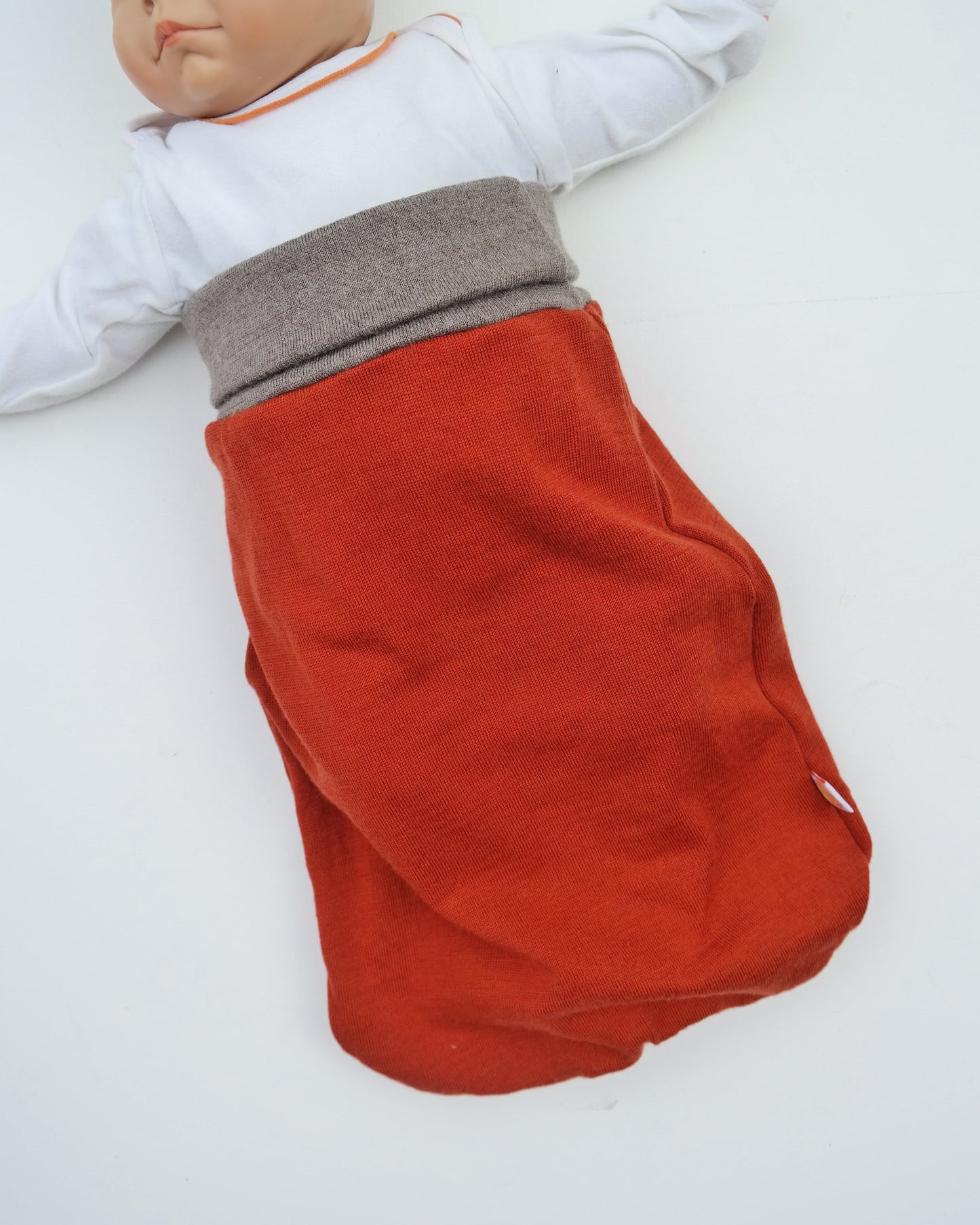 Lightweight summer romper sleeping bag for babies 0-6 months made from upcycled wool in pastel yellow