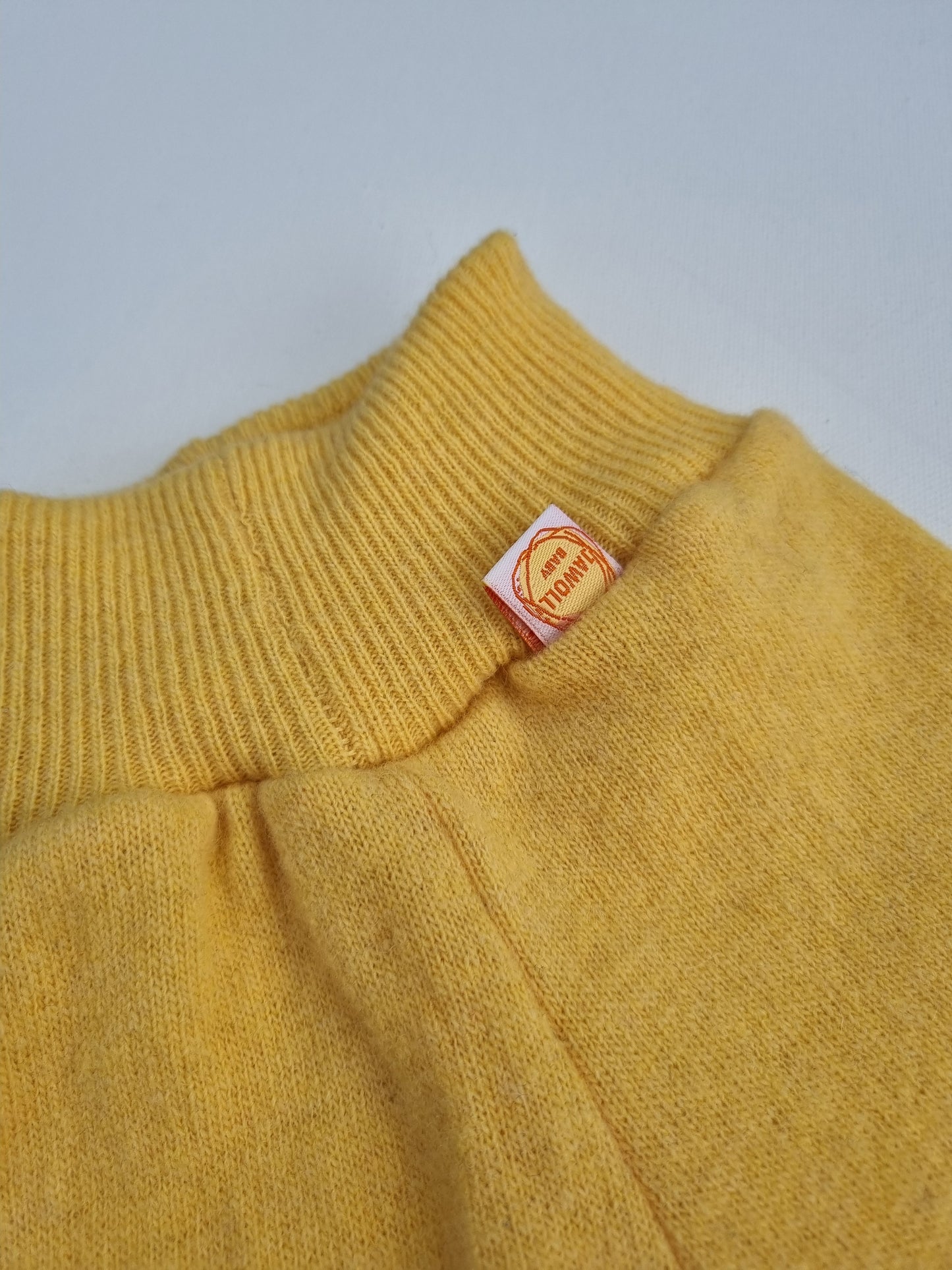 Grow-along trousers 62/68 made from upcycled wool in pastel yellow