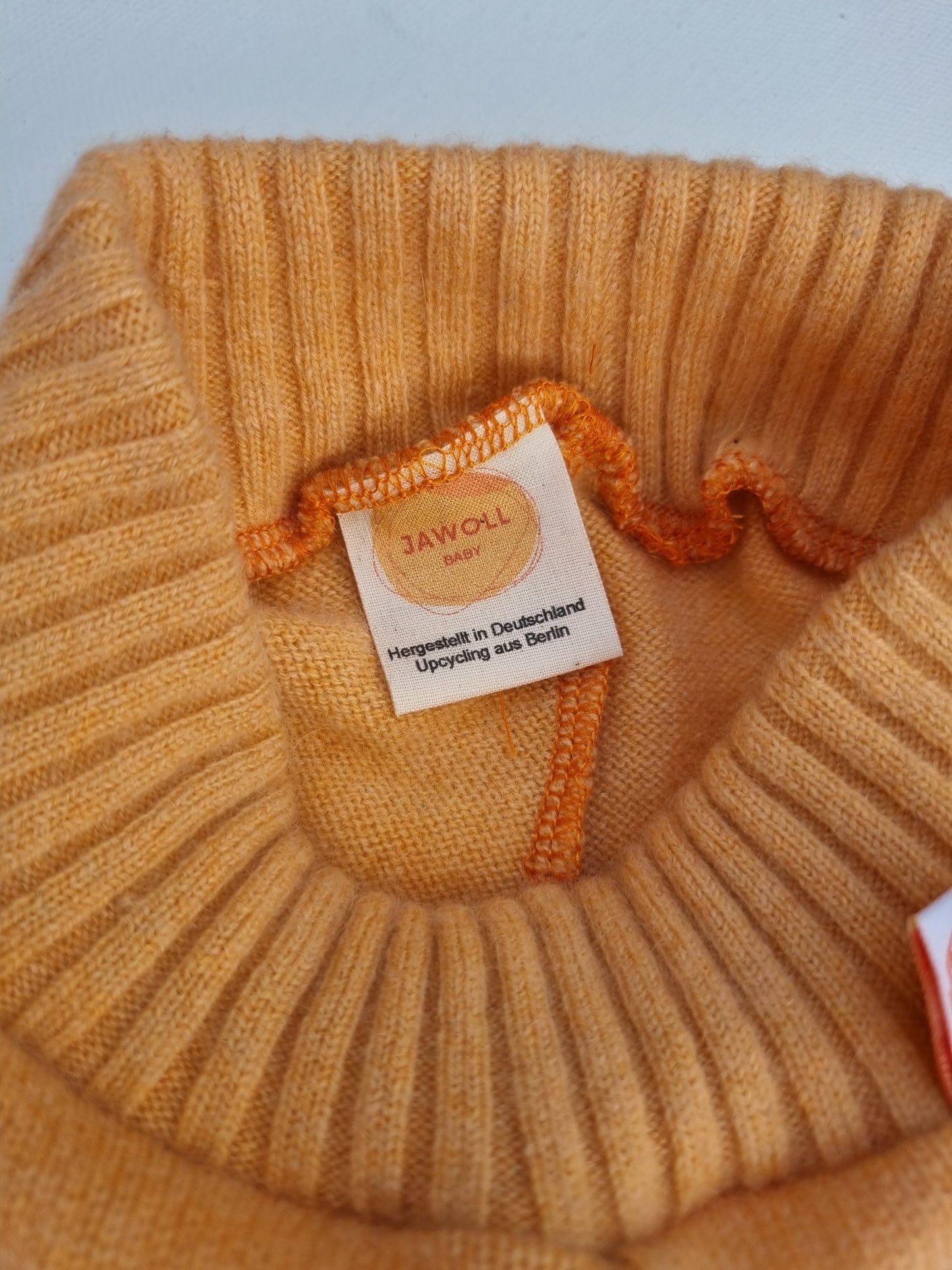 Growing pants for babies 50/56 made from upcycled cashmere in peach-orange